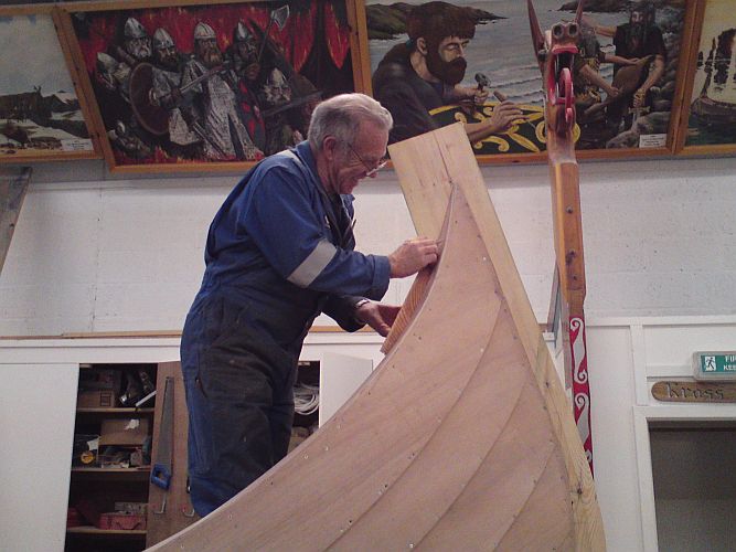 Retired boat builder, Robbie Tait, fitting the forad honeyspot