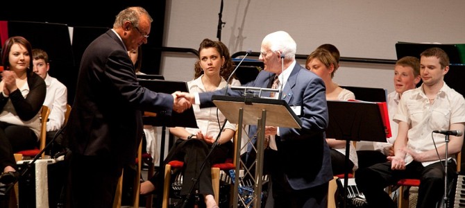 Ross Mainland making the presentation to Sandy Cluness, photo by Billy Fox Photography